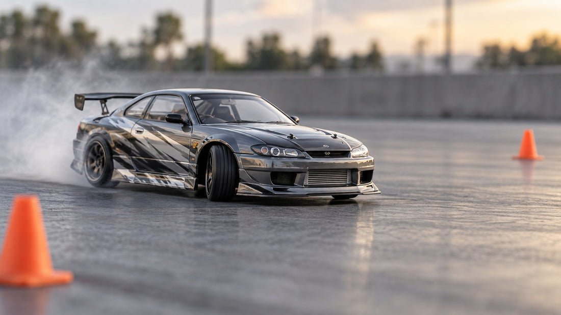 RC drift car sliding through a corner on a smooth track