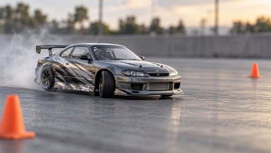 RC drift car sliding through a corner on a smooth track