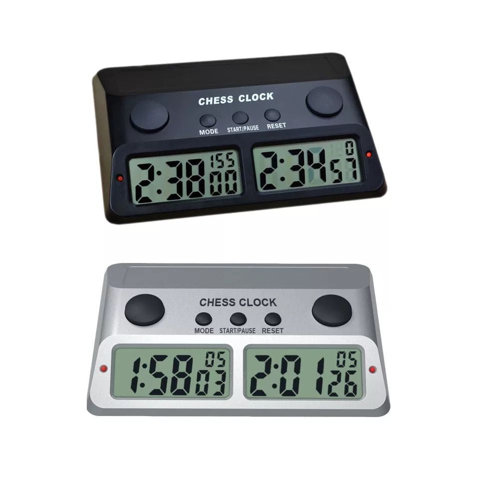 Black and silver digital chess clock's side by side
