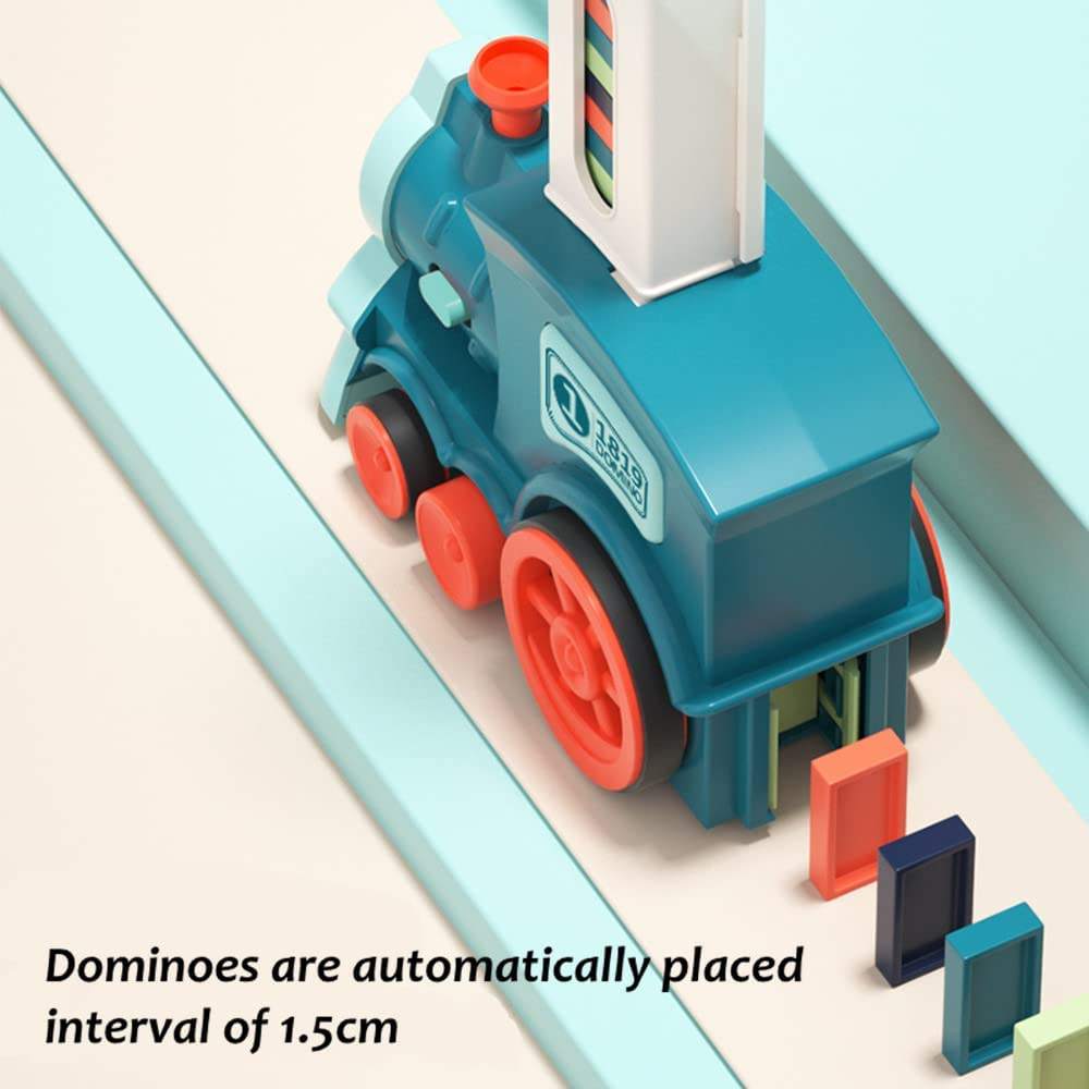 Hand gently pushing the lead piece in a domino chain reaction