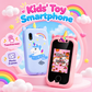 Two unicorn-themed kids' Phone Toy on a pink cloud-like display stand with rainbow and cloud graphics. One phone has a light blue back with a white unicorn and rainbow print, and the other has a pink bumper-style frame with a unicorn horn and colorful screen.