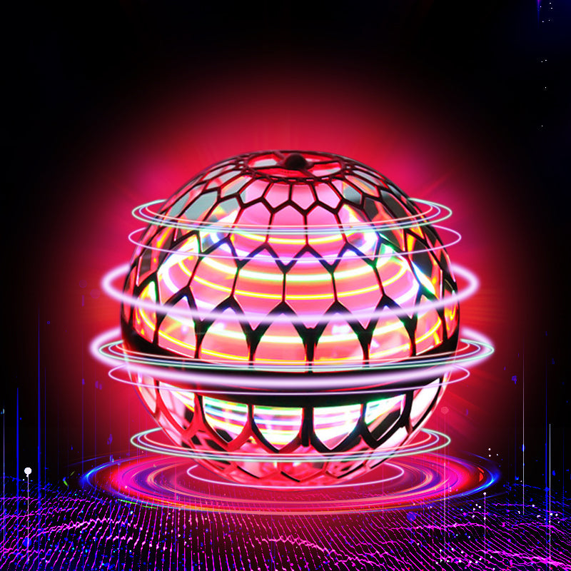Colorful disco flying spinner ball with glowing patterns on a dark background