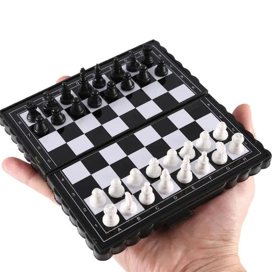Top-down view of the mini chess board unfolded flat with pieces in starting position

