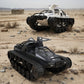 Two remote-controlled tank-like toy vehicles shown in a desert outdoor setting. The top vehicle is white with black tracks and a small white airplane mounted on top.