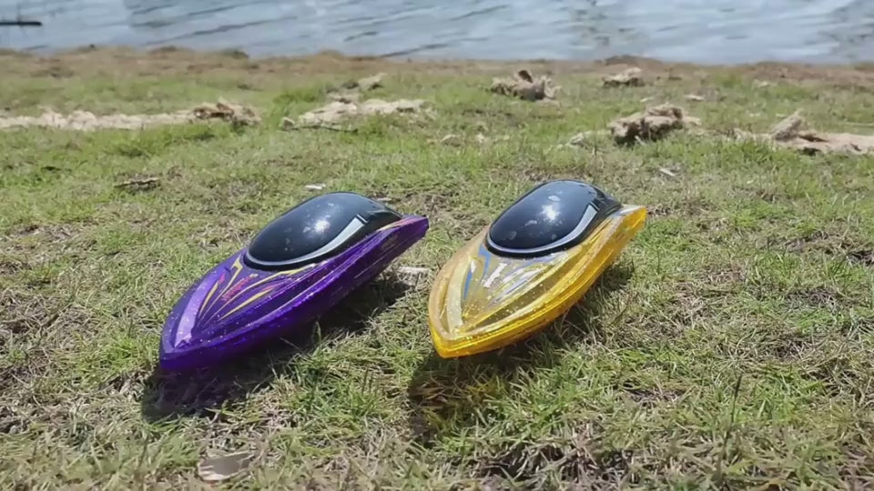 Yellow radio control boat side view